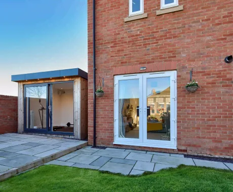 Garden studio next to house